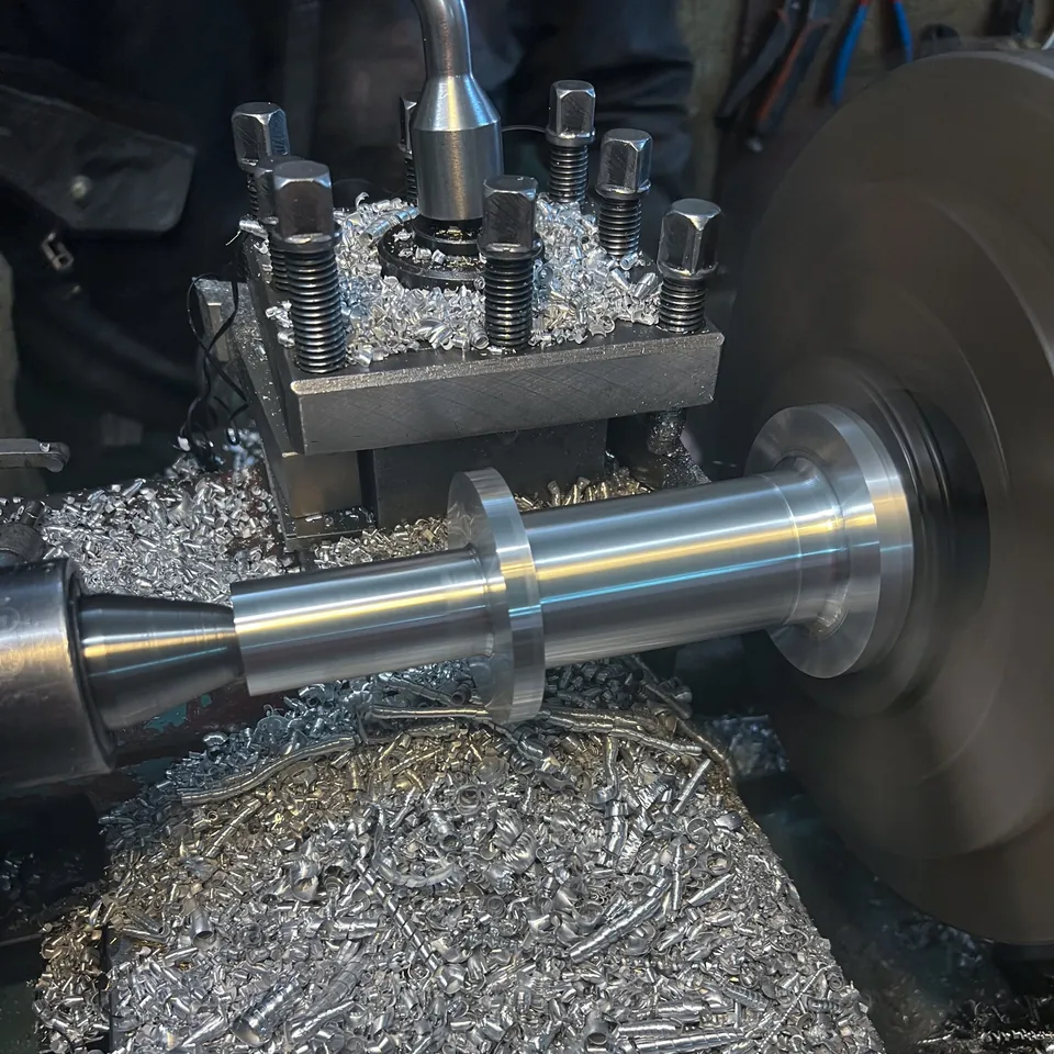 Turning an extruder part on the lathe